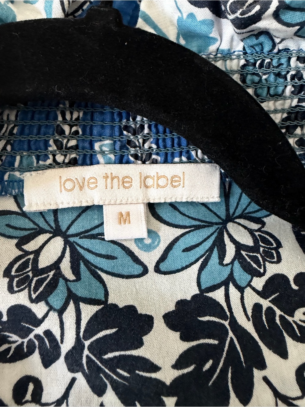love the label Blue Floral Smocked Women's Blouse